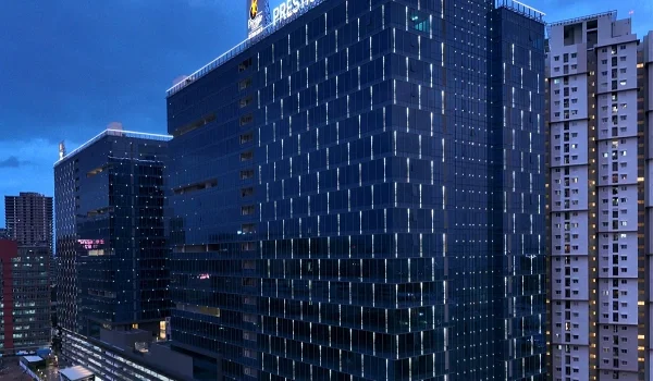 Modern glass facade and architecture of the Prestige Sky Tech commercial development in the Financial District peripheral of Hyderabad.